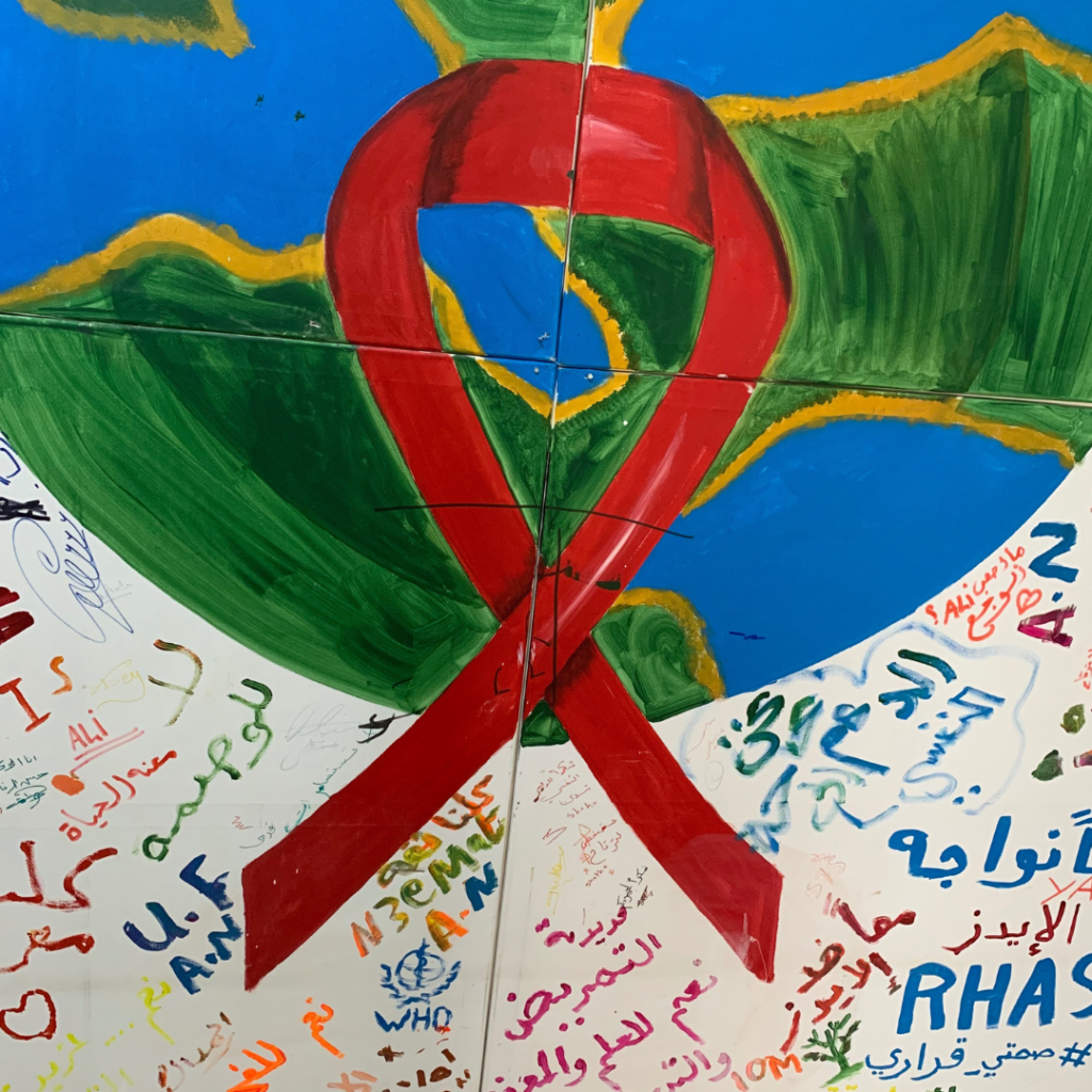 Word Aids Day mural created by NGO beneficiaries